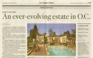 Newspaper article “An ever-evolving estate in O.C.” with a photograph of an estate and swimming pool.