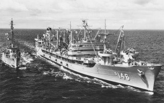 Black and white photograph of the USS Kawishiwi fleet oiler at sea.