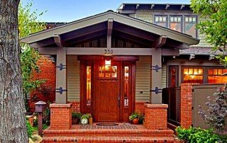 Craftsman home with a covered front porch in the Belmont Park neighborhood of Long Beach.