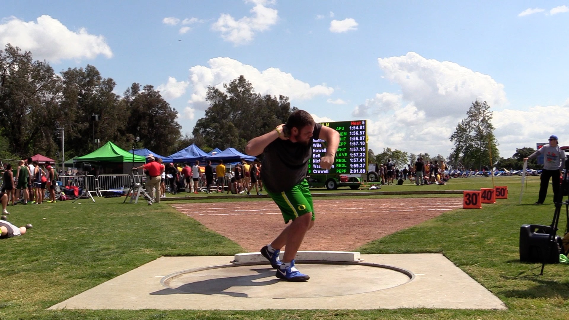 Let ’Em Play – Kurt Axene Throwing Kurt Axene preparing a throw from a track and field throwing circle.